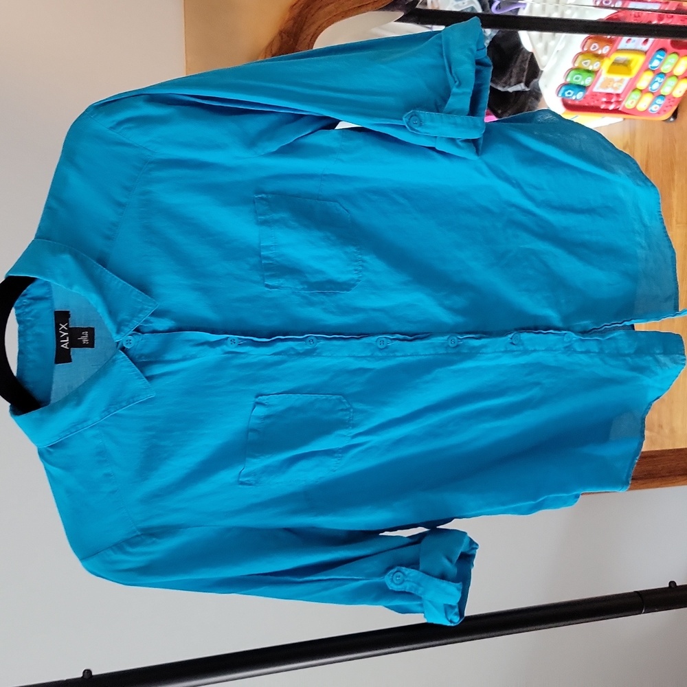 9. Turquoise button down top